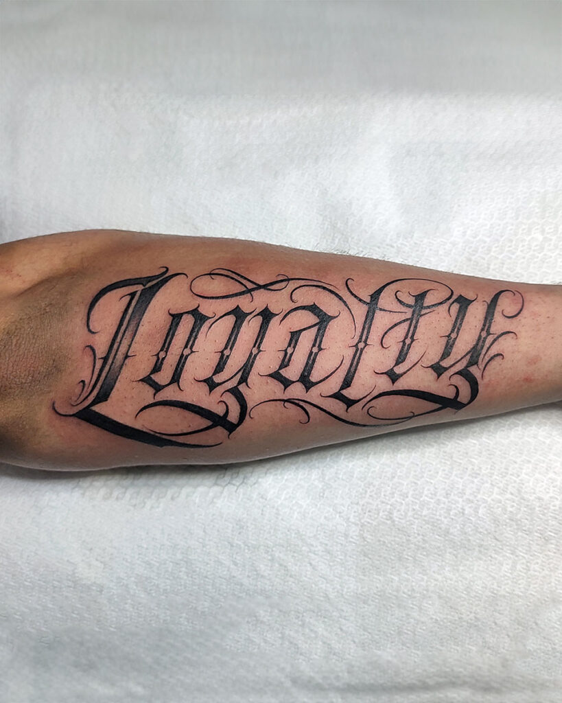 tattoo black work lettering